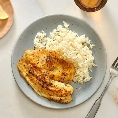 Halal fried tilapia fish with rice in Queens, NY